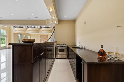 Bar with Granite counters & Gas Stove - 6771 Calaguiro Drive, Niagara Falls, ON - Indoor Photo Showing Kitchen