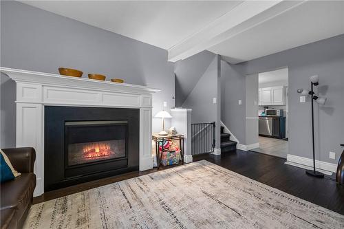 17 Joncaire Place, Stoney Creek, ON - Indoor Photo Showing Living Room With Fireplace