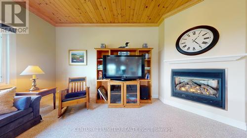 5400 Sutter Creek Dr, Hamilton Township, ON - Indoor Photo Showing Living Room With Fireplace