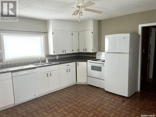 652 Mccallum Avenue, Birch Hills, SK - Indoor Photo Showing Kitchen With Double Sink