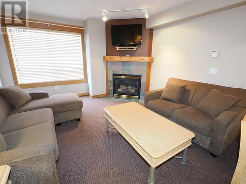 5335 Big White Road Unit# 303/305, Big White, BC - Indoor Photo Showing Living Room With Fireplace