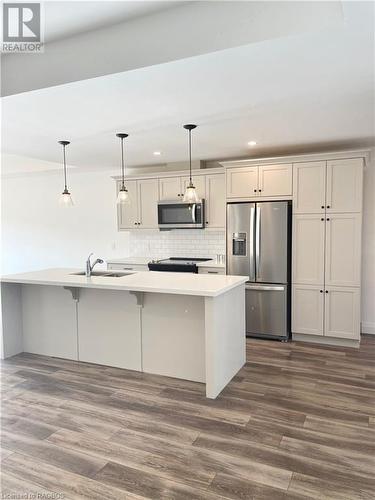 Finished Wyatt Model in earlier phase - 82 Eagle Court Unit# 17, Saugeen Shores, ON - Indoor Photo Showing Kitchen With Upgraded Kitchen