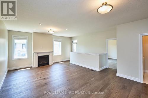 115 Borden Tr, Welland, ON - Indoor Photo Showing Living Room With Fireplace