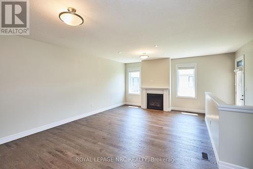 115 Borden Tr, Welland, ON - Indoor Photo Showing Living Room With Fireplace