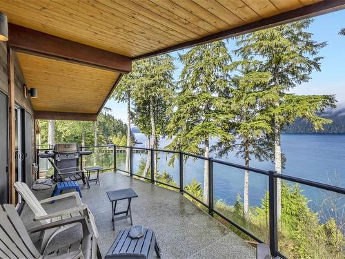 250-6596 Baird Rd, Port Renfrew, BC - Outdoor With Body Of Water With Deck Patio Veranda With Exterior