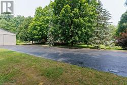 Paved driveway, room for lots of parking - 