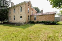 View of back of house with private quarters addition - 