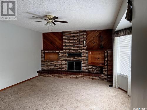 42 Shannon Street, Lanigan, SK - Indoor With Fireplace