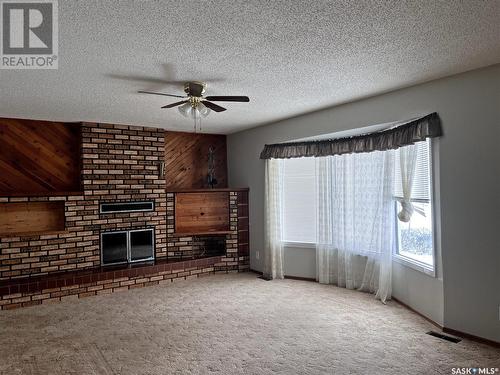 42 Shannon Street, Lanigan, SK - Indoor With Fireplace