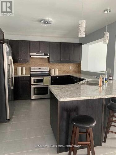 1815 Brown Drive, London, ON - Indoor Photo Showing Kitchen With Double Sink With Upgraded Kitchen