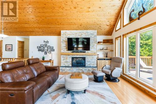 702 Pinecone Road, Skead, ON - Indoor Photo Showing Living Room With Fireplace
