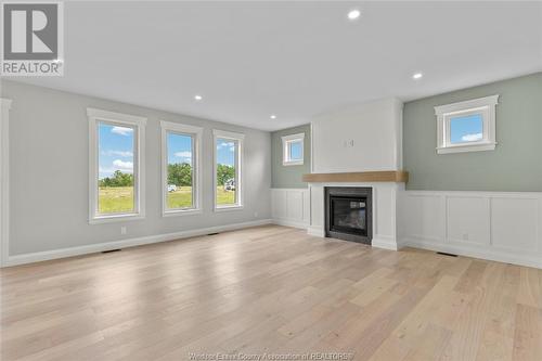 263 Joan Flood, Essex, ON - Indoor Photo Showing Living Room With Fireplace