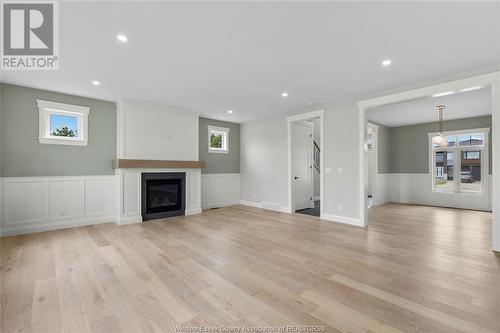 263 Joan Flood, Essex, ON - Indoor Photo Showing Living Room With Fireplace