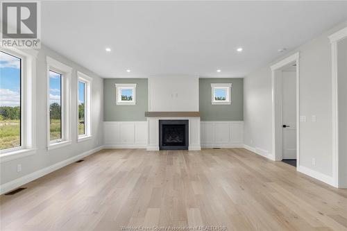 263 Joan Flood, Essex, ON - Indoor Photo Showing Living Room With Fireplace