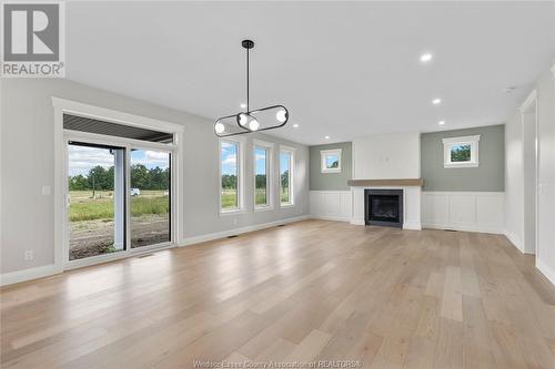 263 Joan Flood, Essex, ON - Indoor Photo Showing Living Room With Fireplace