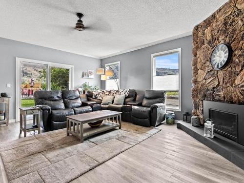 733 Durango Drive, Kamloops, BC - Indoor Photo Showing Living Room With Fireplace