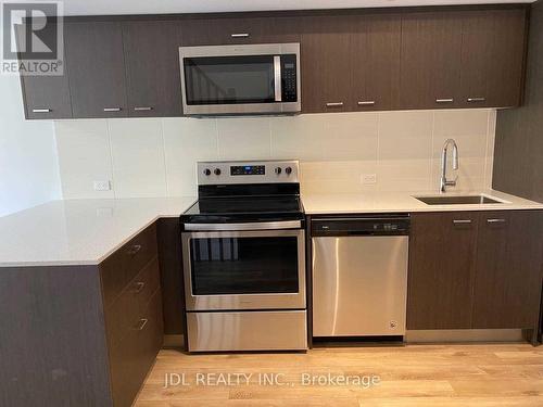 327 - 2100 Bridletowne Circle, Toronto, ON - Indoor Photo Showing Kitchen With Stainless Steel Kitchen With Upgraded Kitchen