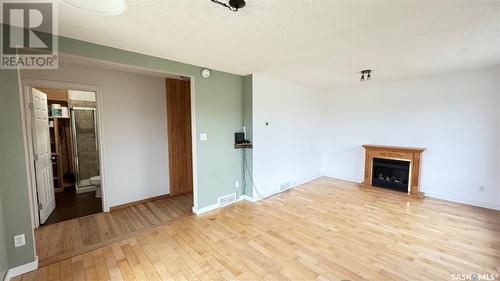 314 Saskatchewan Avenue, Loreburn, SK - Indoor Photo Showing Other Room With Fireplace