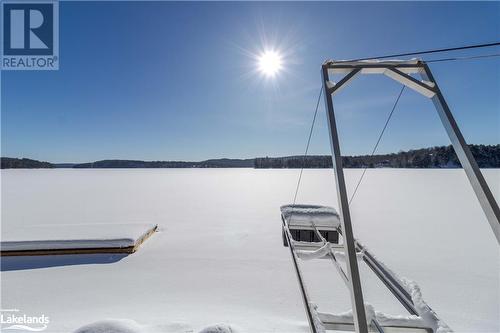 Dock and Waterfront in the Winter View 2 - 1216 Johnson Bay Road, Haliburton, ON - Outdoor With Body Of Water With View