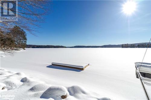Dock and Waterfront in the Winter View 3 - 1216 Johnson Bay Road, Haliburton, ON - Outdoor With Body Of Water With View