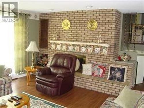 1081-1083 Main Highway, Placentia, NL - Indoor Photo Showing Living Room With Fireplace