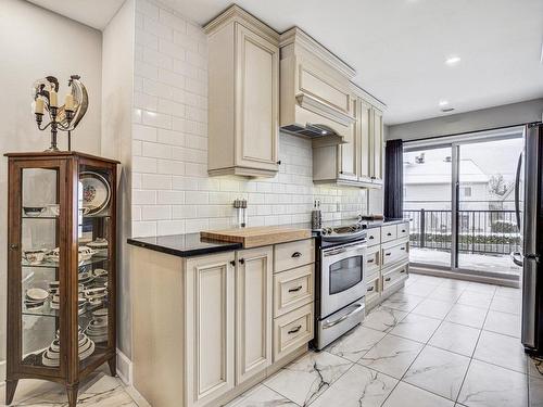 Cuisine - 18022 Rue Roland-Ouellette, Mirabel, QC - Indoor Photo Showing Kitchen With Upgraded Kitchen