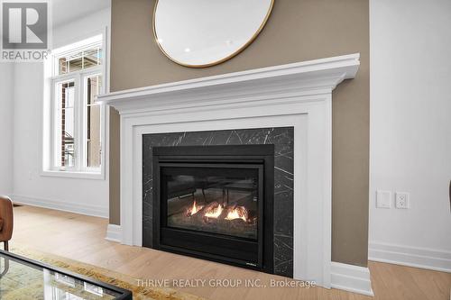 15 - 1080 Upperpoint Avenue, London, ON - Indoor Photo Showing Living Room With Fireplace