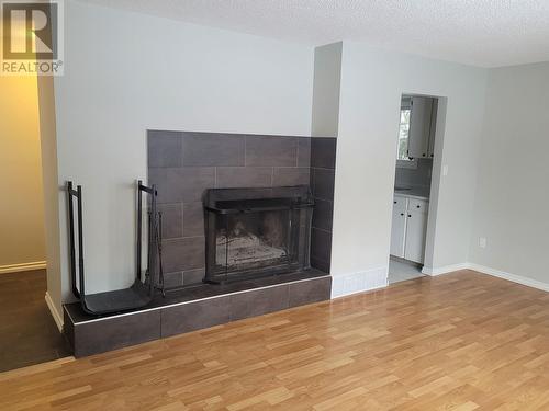 7645 Kingsley Crescent, Prince George, BC - Indoor Photo Showing Living Room With Fireplace