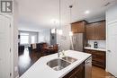 506 2055 Rose Street, Regina, SK  - Indoor Photo Showing Kitchen With Double Sink 