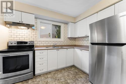 #55 -1095 Mississaga St W, Orillia, ON - Indoor Photo Showing Kitchen With Double Sink
