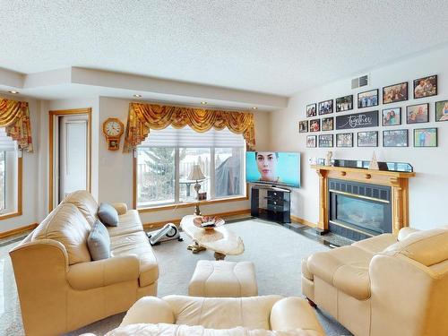 2C 1350 Huron Street, Keewatin, ON - Indoor Photo Showing Living Room With Fireplace