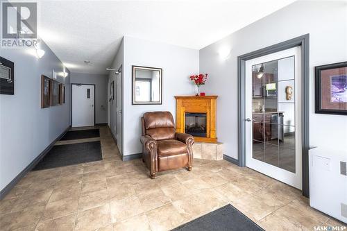 202 2006 7Th Street, Rosthern, SK - Indoor With Fireplace