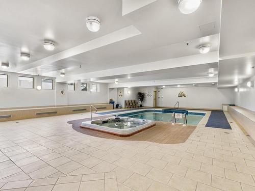 Pool - 415-7930 Boul. Viau, Montréal (Saint-Léonard), QC - Indoor Photo Showing Other Room With In Ground Pool