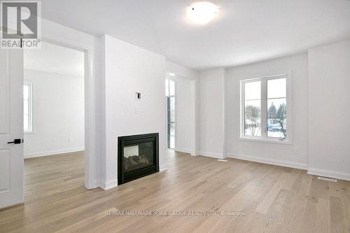 #5 -11 Bay St E, Blue Mountains, ON - Indoor With Fireplace