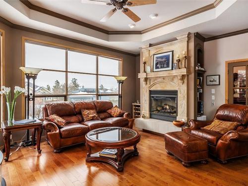 5416 Tanager Court, Kelowna, BC - Indoor Photo Showing Living Room With Fireplace