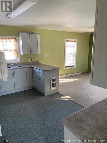 344 Adelaide Street, Dalhousie, NB - Indoor Photo Showing Kitchen With Double Sink