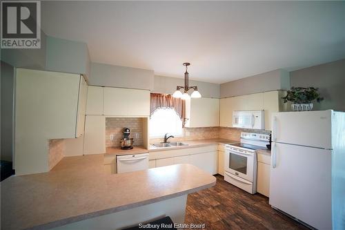 802 Piquette Road, Verner, ON - Indoor Photo Showing Kitchen With Double Sink