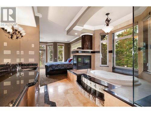 4160 June Springs Road, Kelowna, BC - Indoor With Fireplace