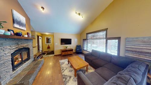 4758 Crescentwood Drive, Edgewater, BC - Indoor Photo Showing Living Room With Fireplace