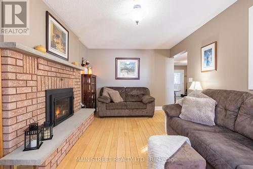 725 Broadview Ave, Orillia, ON - Indoor Photo Showing Living Room With Fireplace