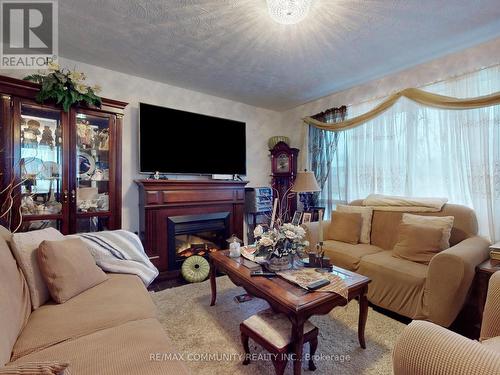 760 Phillip Murray Ave, Oshawa, ON - Indoor Photo Showing Living Room With Fireplace