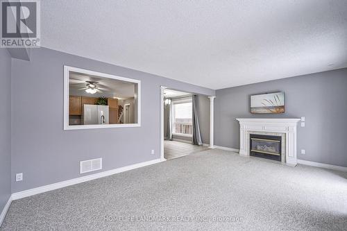 50 Raspberry Trail, Thorold, ON - Indoor Photo Showing Living Room With Fireplace