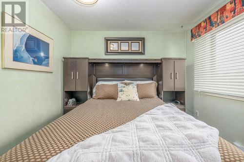 6430 Whiskey Jack Road Unit# 107, Big White, BC - Indoor Photo Showing Bedroom