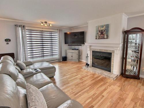 Salon - 851 Rue Carpentier, Amos, QC - Indoor Photo Showing Living Room With Fireplace