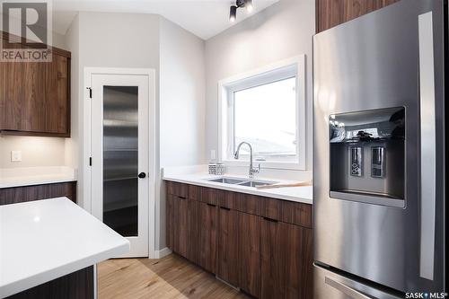 5210 Squires Road, Regina, SK - Indoor Photo Showing Kitchen With Double Sink