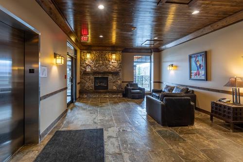 208 - 1545 Kicking Horse Trail, Golden, BC - Indoor With Fireplace