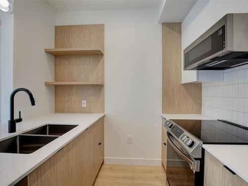 208-1301 Hillside Ave, Victoria, BC - Indoor Photo Showing Kitchen With Double Sink