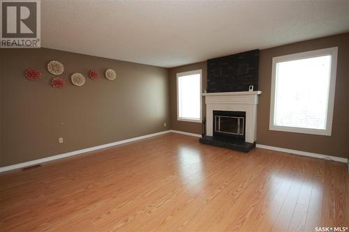 92 24Th Street, Battleford, SK - Indoor Photo Showing Other Room With Fireplace