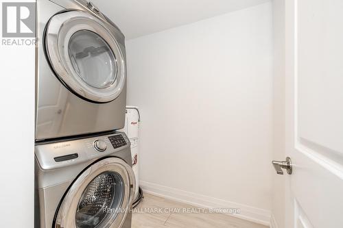 #402 -299 Cundles Rd E, Barrie, ON - Indoor Photo Showing Laundry Room