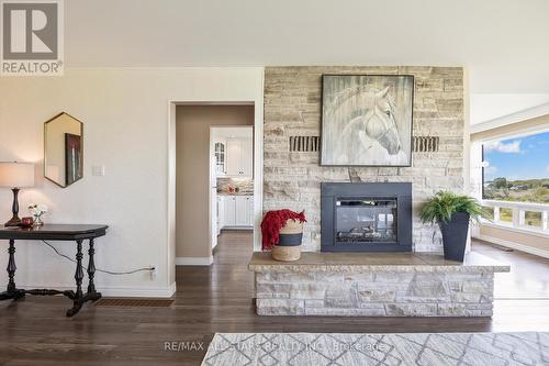 C20750 Highway 12, Brock, ON - Indoor Photo Showing Living Room With Fireplace